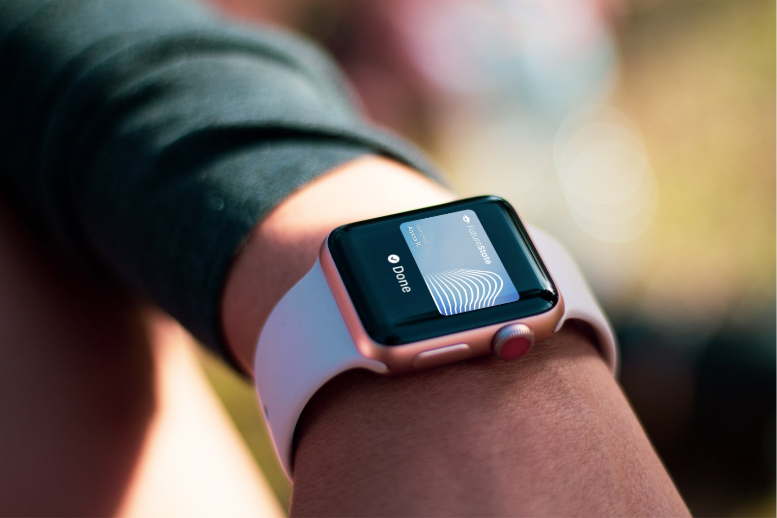 Apple Watch showing a FutureState employee badge in Apple Wallet